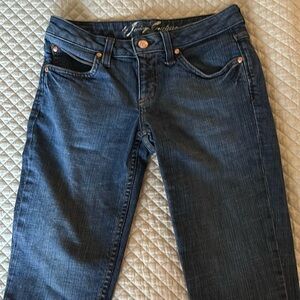 Denim shorts. Long legs fringe